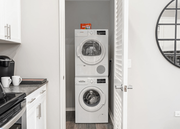 Kitchen with washer dryer